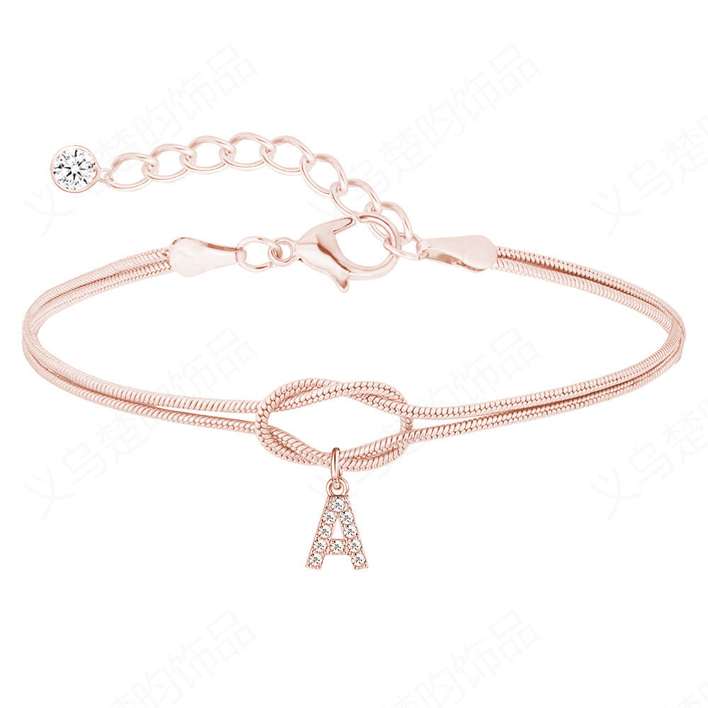 Braided bracelet with zirconia alphabet letters