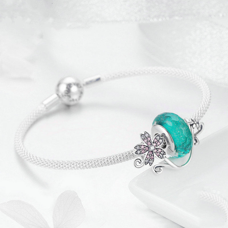 Silver flower bracelet with decorations