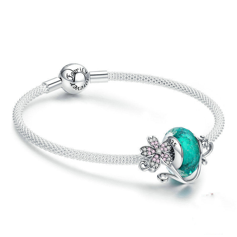 Silver flower bracelet with decorations