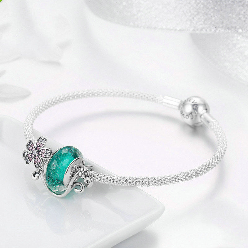 Silver flower bracelet with decorations