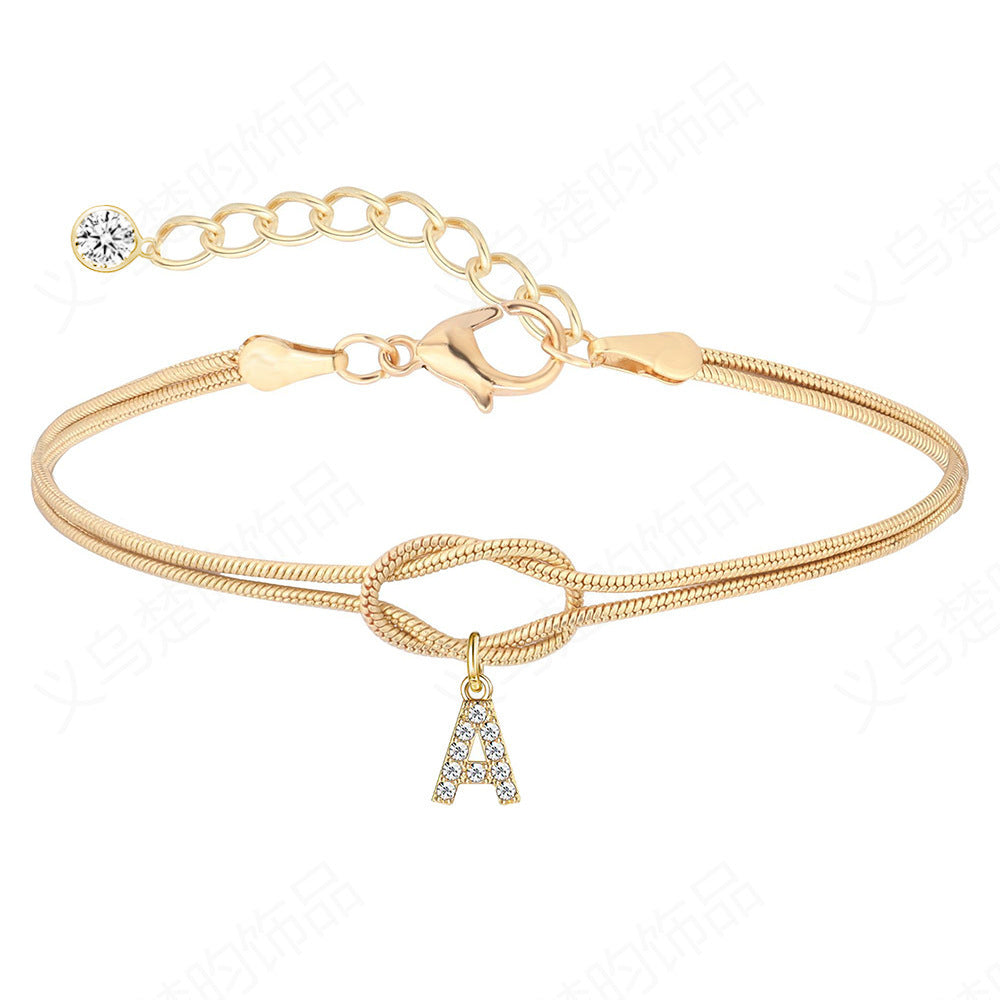 Braided bracelet with zirconia alphabet letters