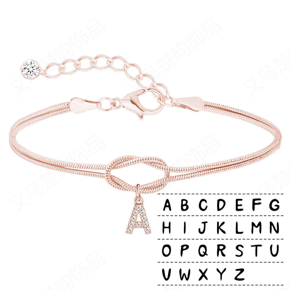 Braided bracelet with zirconia alphabet letters