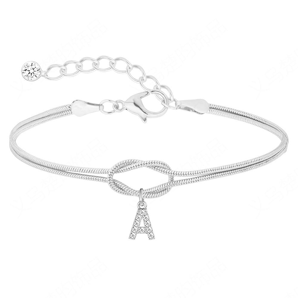Braided bracelet with zirconia alphabet letters