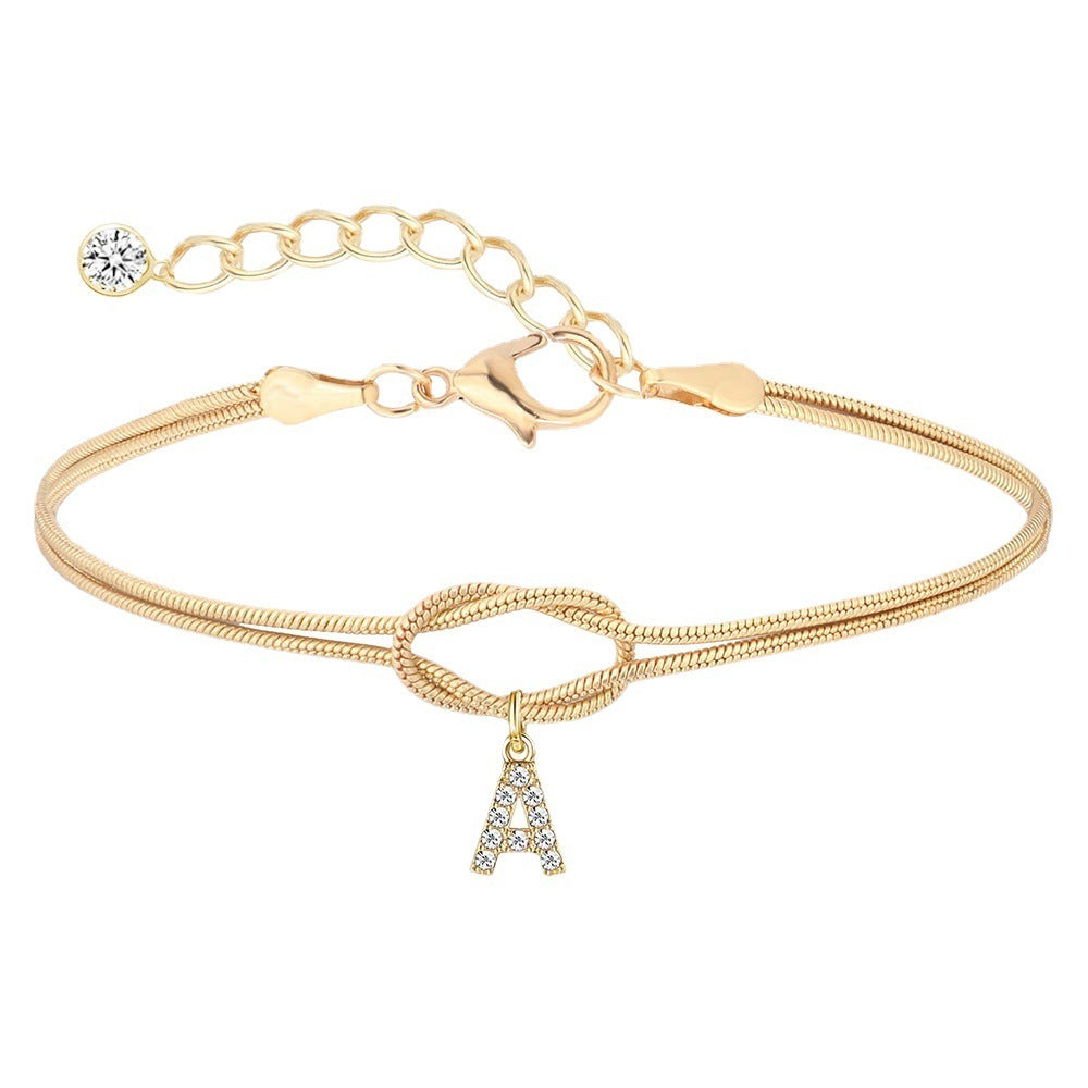 Braided bracelet with zirconia alphabet letters