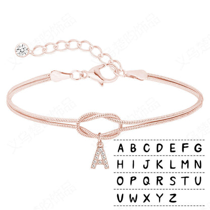 Bracciale intrecciato con zirconi lettere dell'alfabeto