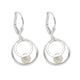 Orecchini argento 925 a cerchi concentrici con perla naturale, design ispirato alla natura